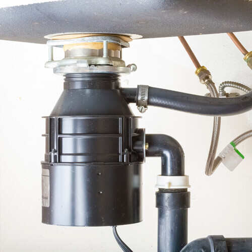 garbage disposal under a sink