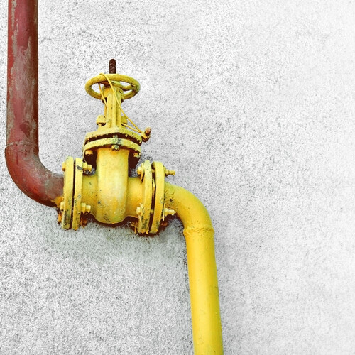 gas line against a wall